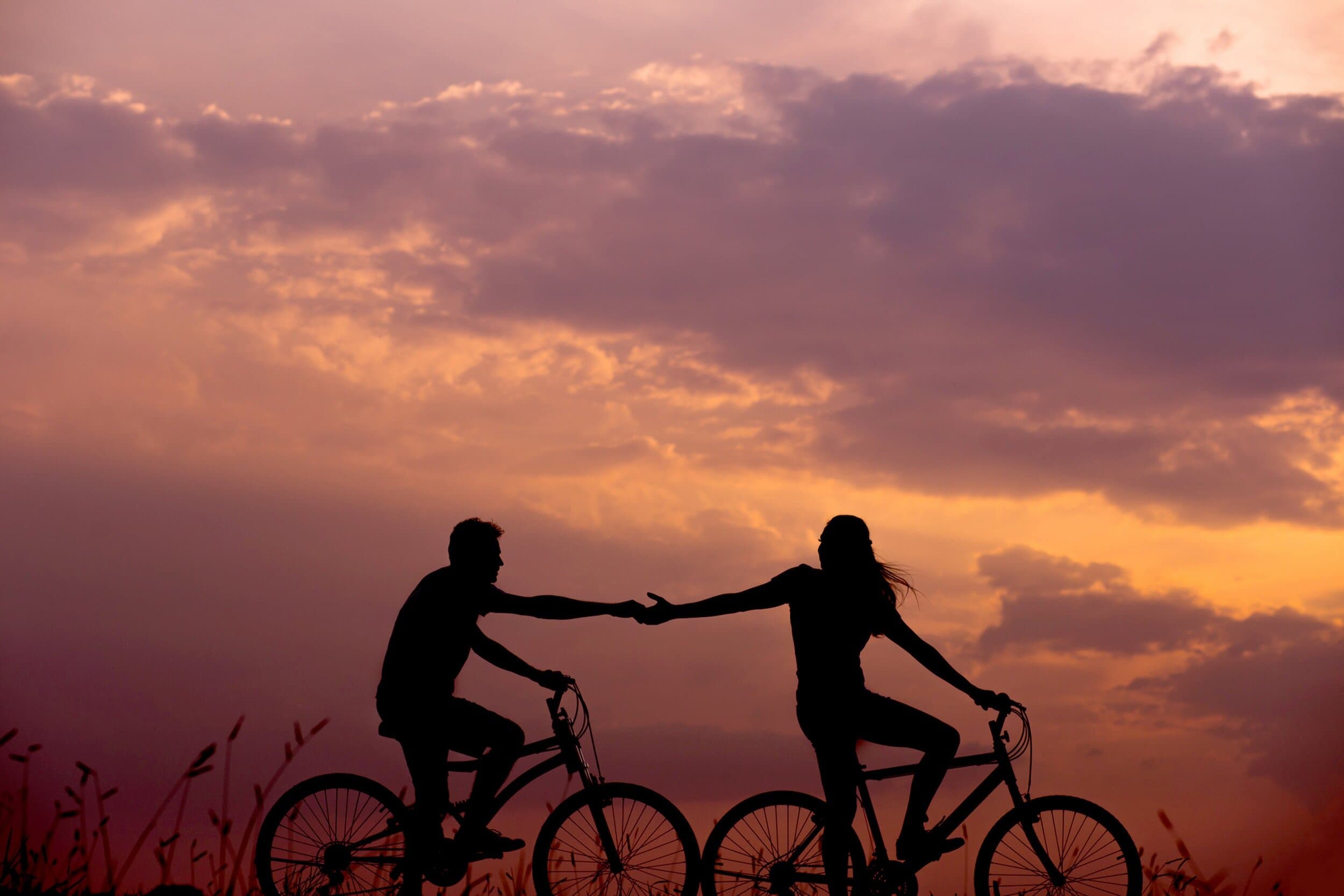 Cyclists riding at sunset on a country road in Idaho